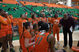 FAMU Lady Rattlers gather in a huddle during a timeout