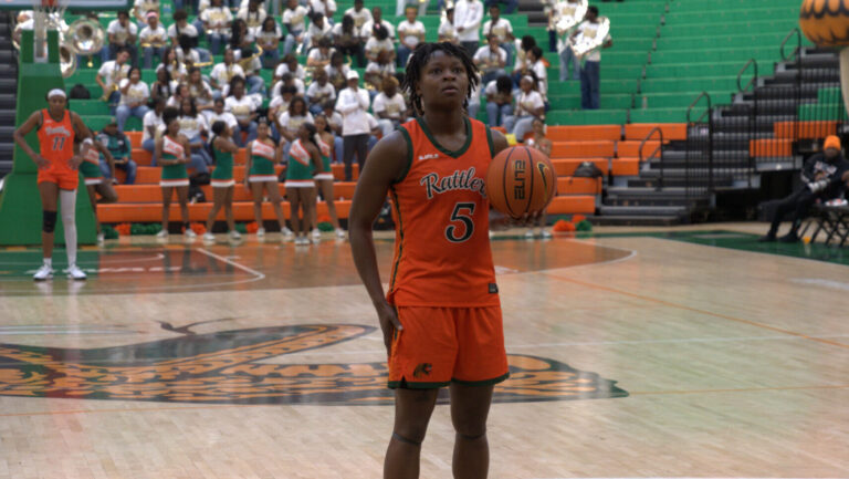 Camille Jackson (G) lines up to shoot free throws
